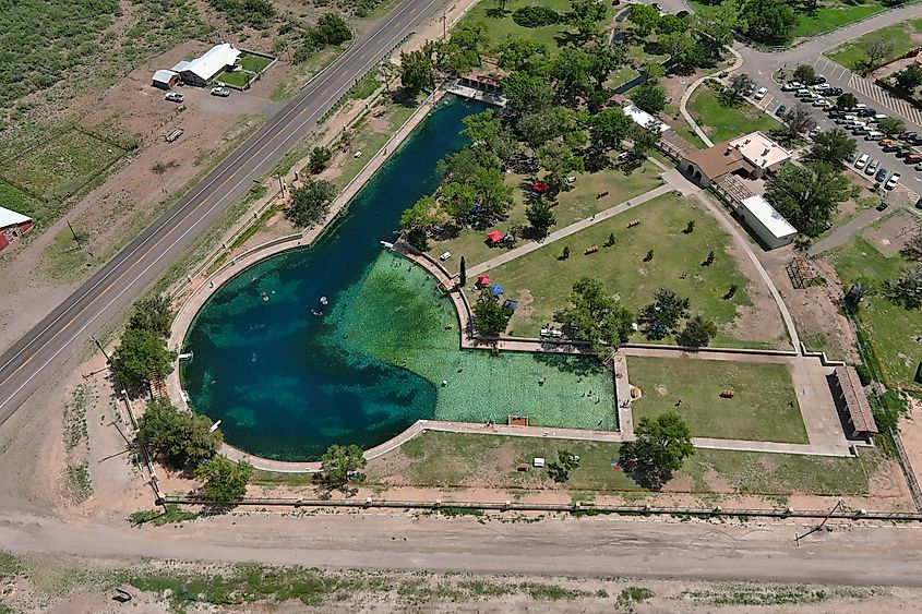 Aerial drone photo of the world largest spring fed pool at Balmorhea State Park in West Texas