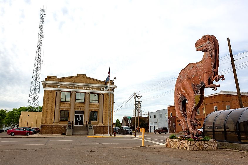 A dinosaur statue next to the City Hall in Glendive, Montana