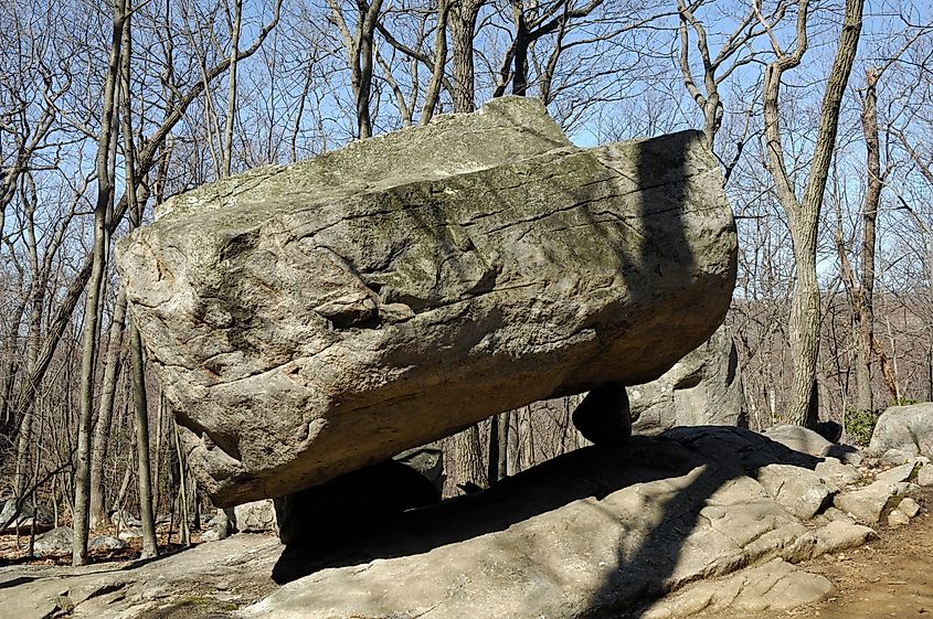 Tripod Rock, a massive glacial erratic balanced on three smaller stones, located in Pyramid Mountain Park, New Jersey