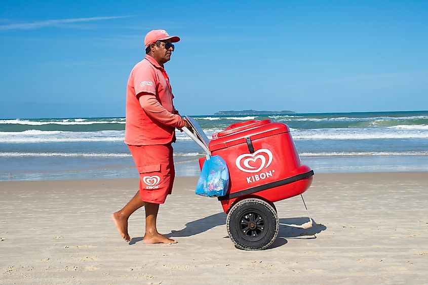 Man selling ice creams of the famous brand Kibon at the beach. Editorial credit: M.Antonello Photography / Shutterstock.com