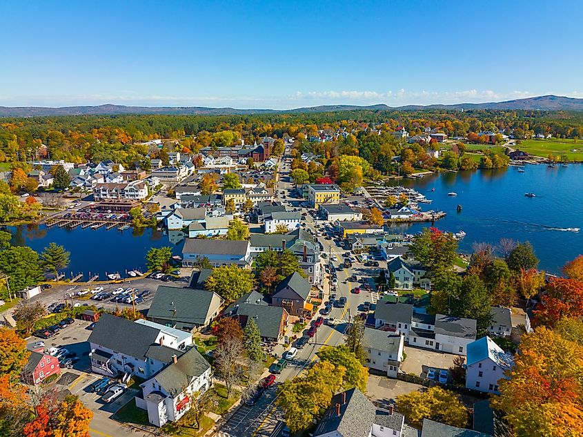 Wolfeboro historic town center at Lake Winnipesaukee aerial view in fall on Main Street, town of Wolfeboro, New Hampshire NH, USA.