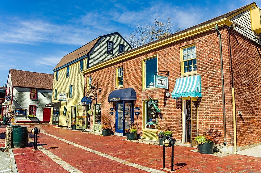 Retail Shopfronts and Historic Buildings at Bowen's Wharf in Newport. Editorial credit: Albert Pego / Shutterstock.com