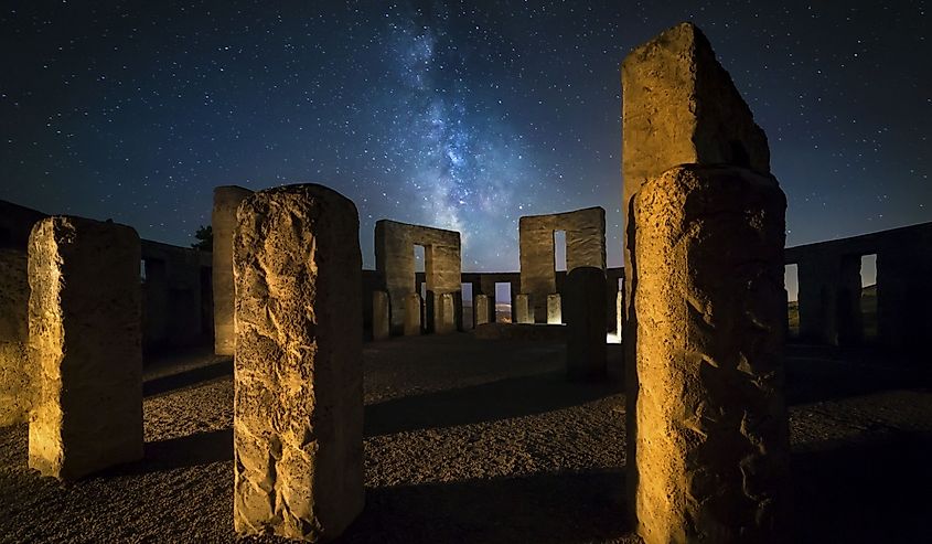 Stonehenge replica at night with a milky road and stars