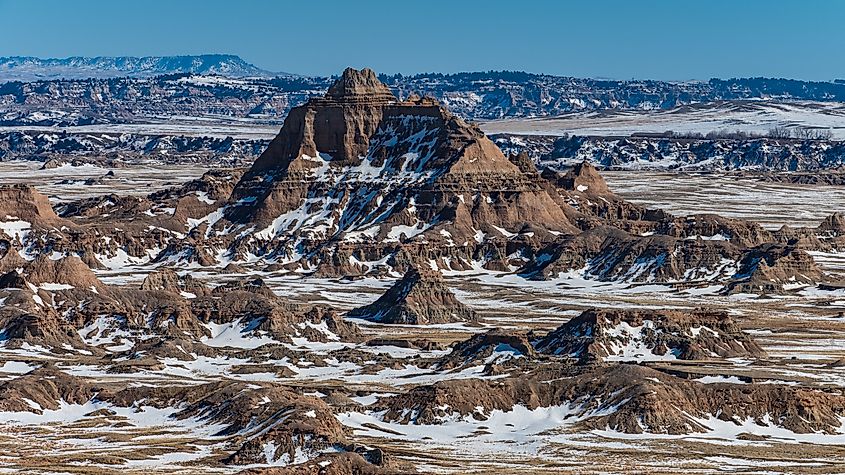 The rock formations and snowy landscapes of Badlands National Park in South Dakota.