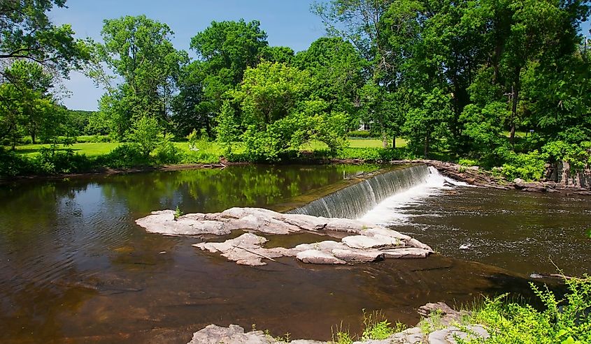 The shepaug river in roxbury connecticut on a sunny summer day in new england.