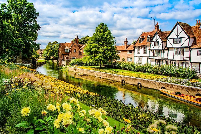 The Great Stour river running through old timbered houses in Canterbury, Kent.