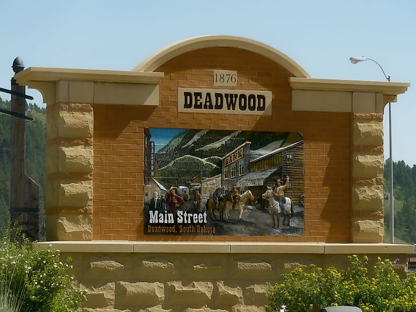 Colorful billboard by the roadside at Deadwood, South Dakot