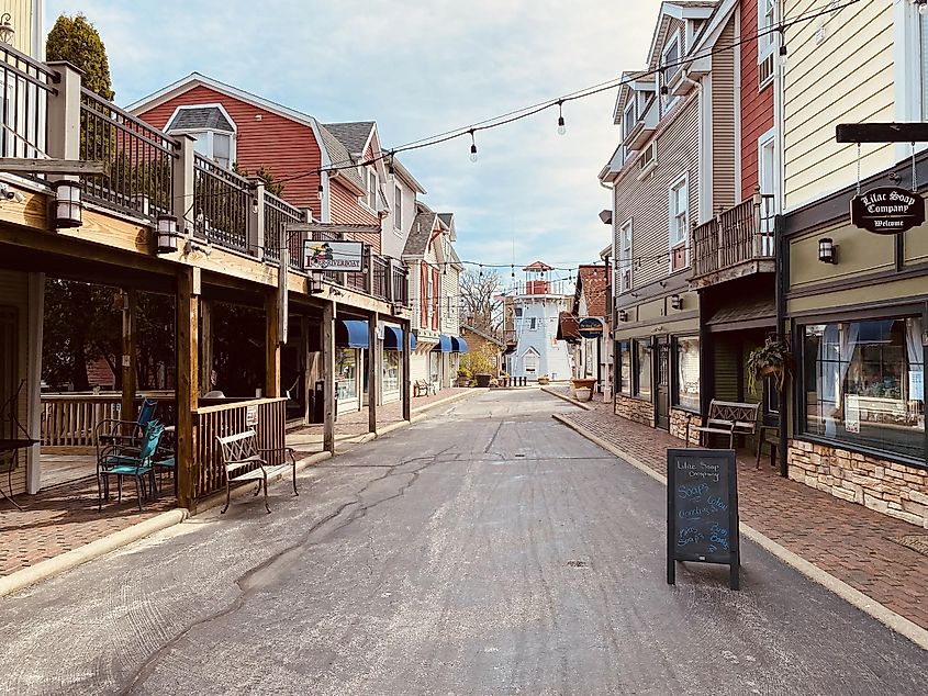 An outdoor commercial district in the style of a fishing village 