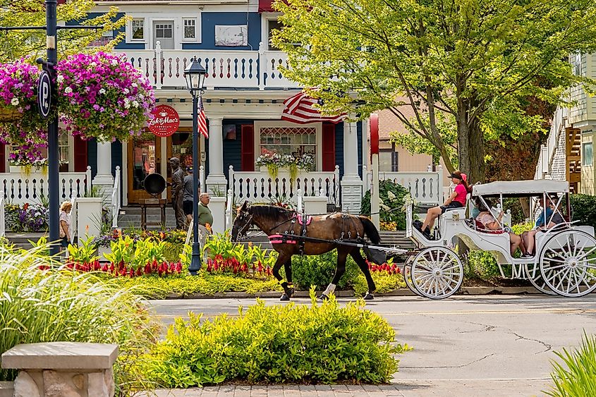 A horse-drawn carriage transports tourists in downtown Frankenmuth, Michigan.