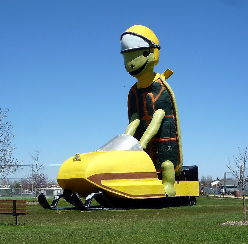 "Tommy Turtle", riding a yellow snowmobile, the symbol of Bottineau, North Dakota.