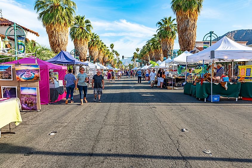 People having a good time at the Palm Springs Street Fair. Editorial credit: mcrvlife / Shutterstock.com.
