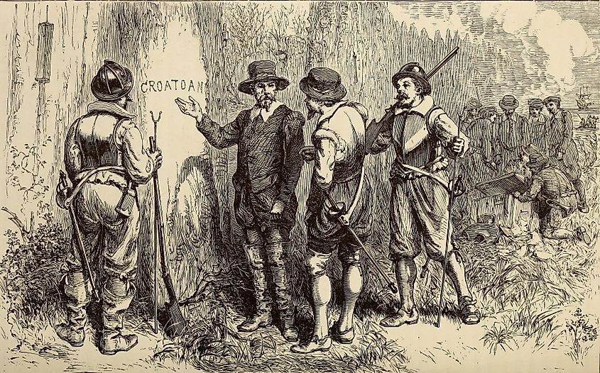 This image depicts John White returning to the Roanoke Colony in 1590 to discover the settlement abandoned. A pallisade had been constructed since White's departure in 1587, and the word "CROATOAN" was found carved near the entrance. design by William Ludwell Sheppard, engraving by William James Linton 