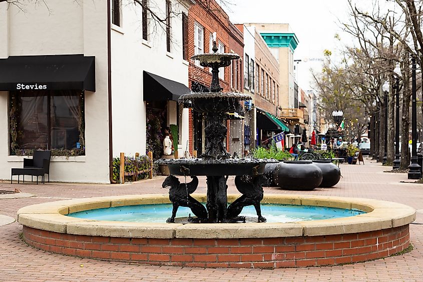 Selective focus view of pretty public vintage fountain on Hay St in Fayetteville, West Virginia. Editorial credit: Anne Richard / Shutterstock.com