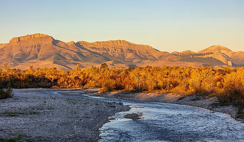 The Teton River with Ear Mountain in autumn at sunrise near Choteau