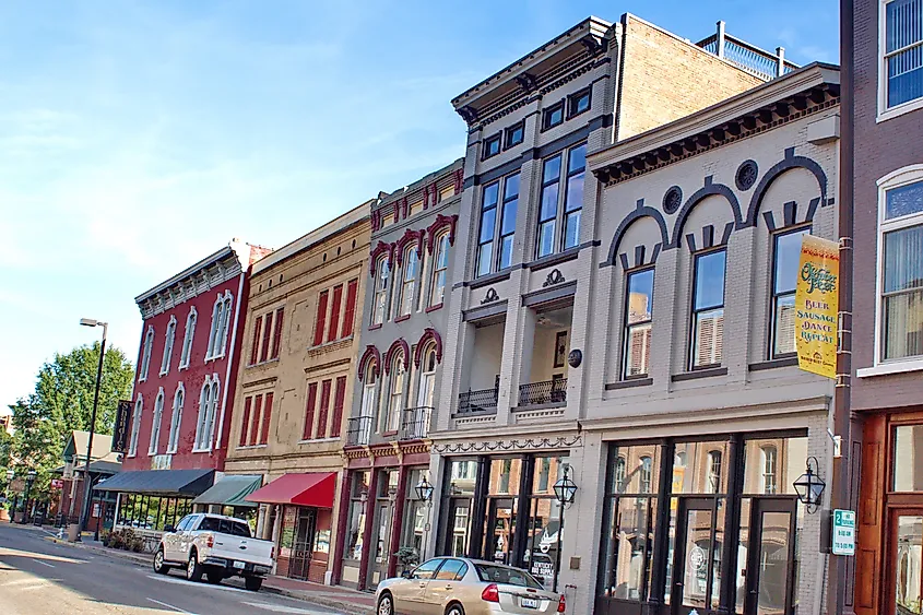 PADUCAH, KENTUCKY, USA - CIRCA OCTOBER 2018: Row of colorful, historic buildings on the main street in the downtown area. Editorial Credit: Angela N Perryman via Shutterstock.