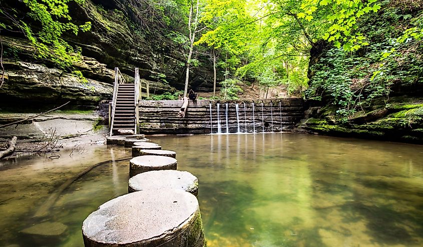 Concrete stepping stones weaving through a canyon in Matthiessen State Park.