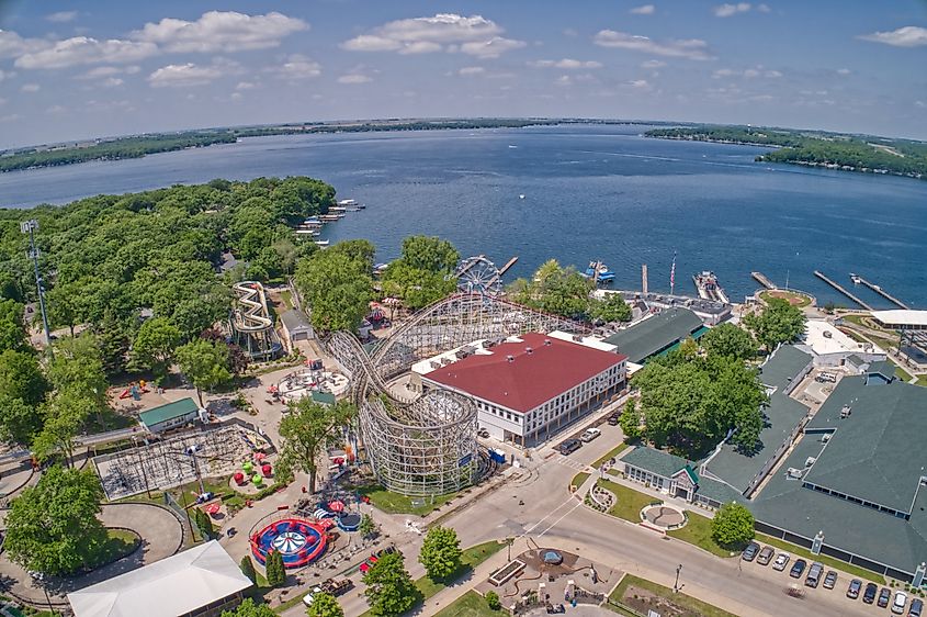 Arnolds Park is a tourist town in the Lake Okoboji area, featuring a popular lakeside amusement park and vibrant attractions for visitors.