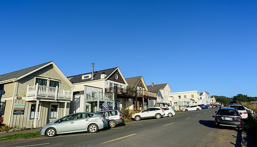 Main Street in downtown Mendocino, California, featuring charming shops, historic buildings, and coastal scenery typical of this picturesque town.