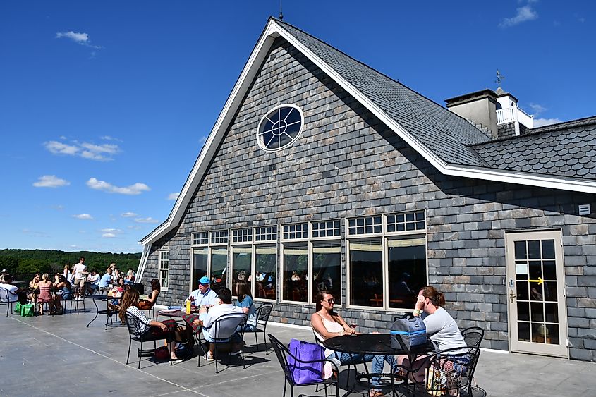 Gouveia Vineyards in Wallingford, Connecticut, featuring rolling vineyards, a rustic stone winery building.