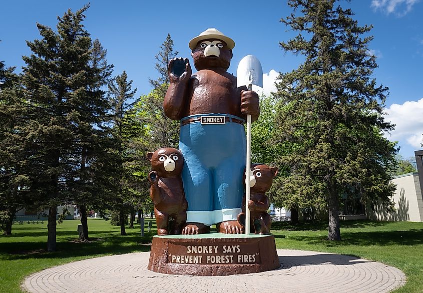 Smokey Bear statue in a park in International Falls, Minnesota