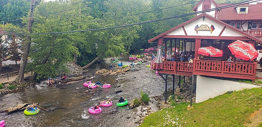 People tubing down the Chattahoochee River in downtown Helen, Georgia