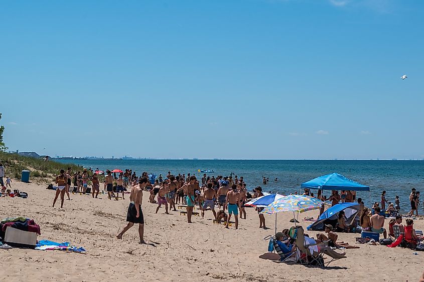 Chesterton, Indiana, USA: Crowded Indiana Dunes beach after reopening.