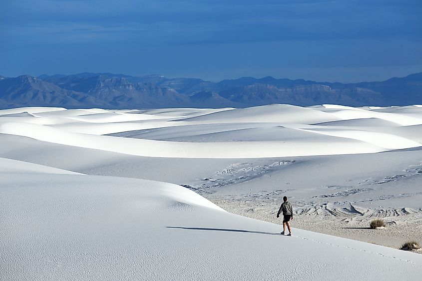 Man walking in the White Sands National Monument New Mexico, USA