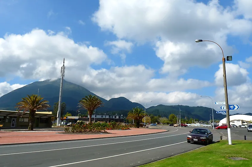 View near Prideaux Park in Kawerau, showing the Information Centre on the left, Kawerau Hotel in the center, and the Ron Hardie Recreational Centre.