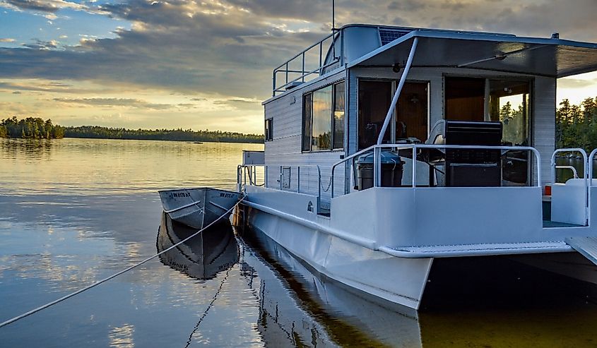 Sunset behind houseboat on lake in Voyageur's National Park in Northern Minnesota.