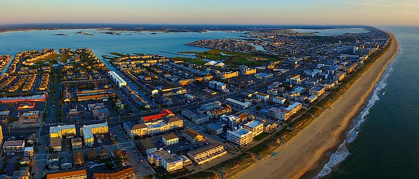 Wide aerial shot of Ocean City, Maryland, looking north at sunrise.