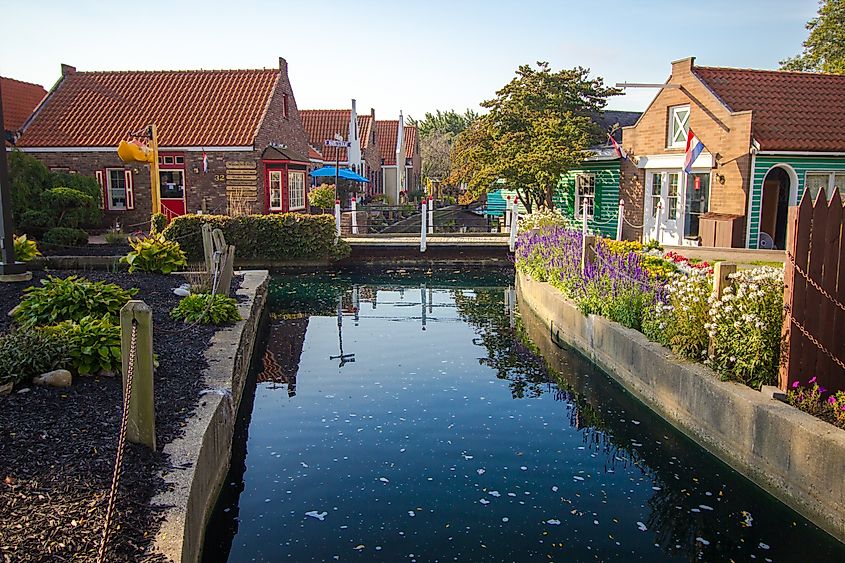 Street scene with canal at Nelis' Dutch Village in Holland, Michigan, USA. 