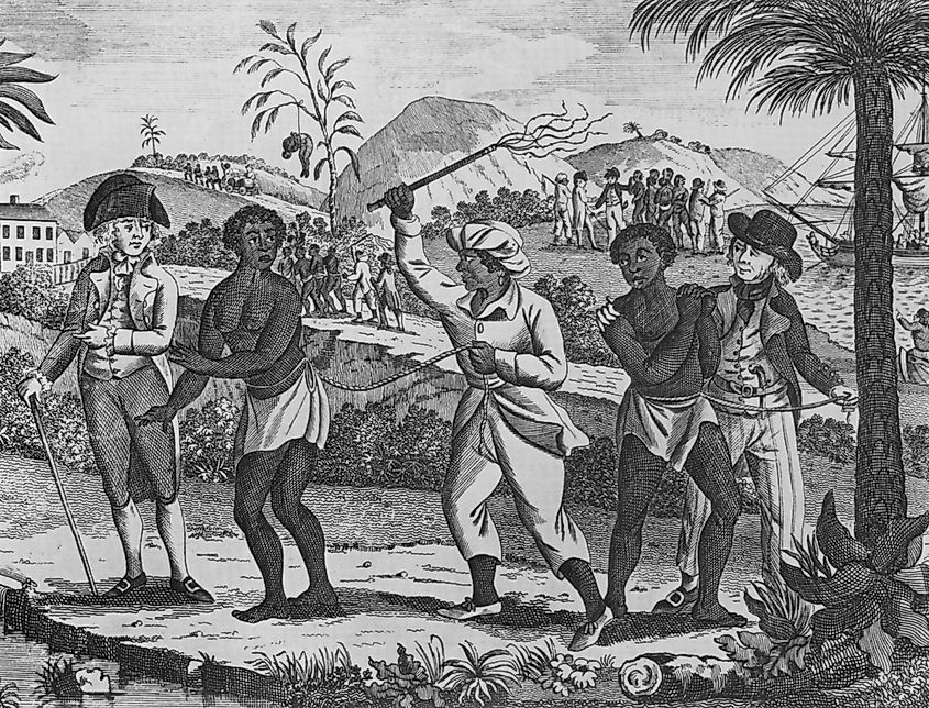 African captives for the Caribbean slave trade. In the foreground a women is whipped. Several groups of newly arrived slaves are leaving the port area in coffles.