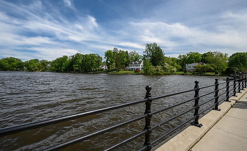 Cranbury, New Jersey, USA, May 19, 2020 - A springtime view of homes along the shore of Brainerd Lake, via Thomas Kloc / Shutterstock.com
