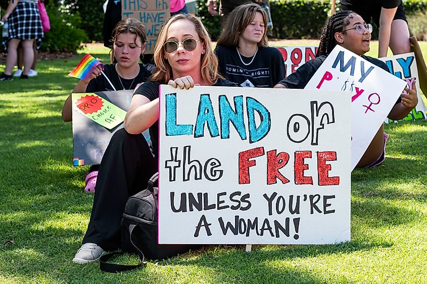 Montgomery, Alabama - July 4, 2022: Protesters march downtown for Women's Reproductive Rights after Roe v. Wade is overturned. Image Credit JNix via Shutterstock.