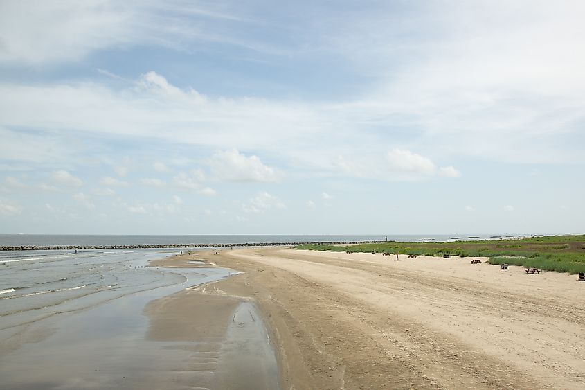 Grand Isle, where sandy beaches, coastal wildlife, fishing boats, and family fun come together along the Gulf of Mexico's Louisiana coastline.