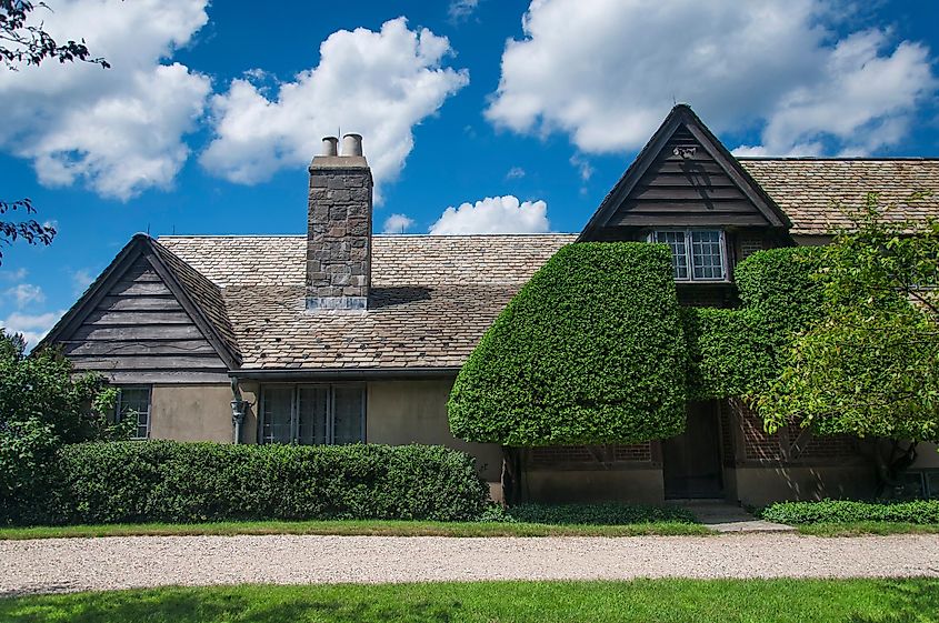 the historic summer cottage at Topsmead state forest park in Litchfield, Connecticut, on a sunny day.