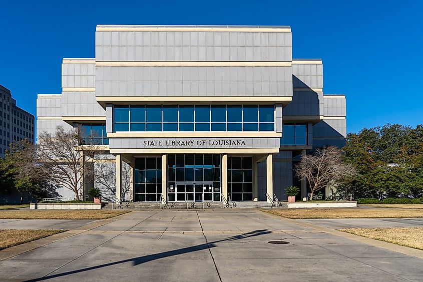 Editorial Photo Credit: JHVEPhoto via Shutterstock. Baton Rouge, Louisiana, USA- February 13, 2022: State Library of Louisiana building in Baton Rouge, Louisiana, USA. The State Library of Louisiana is Louisiana's state library agency.