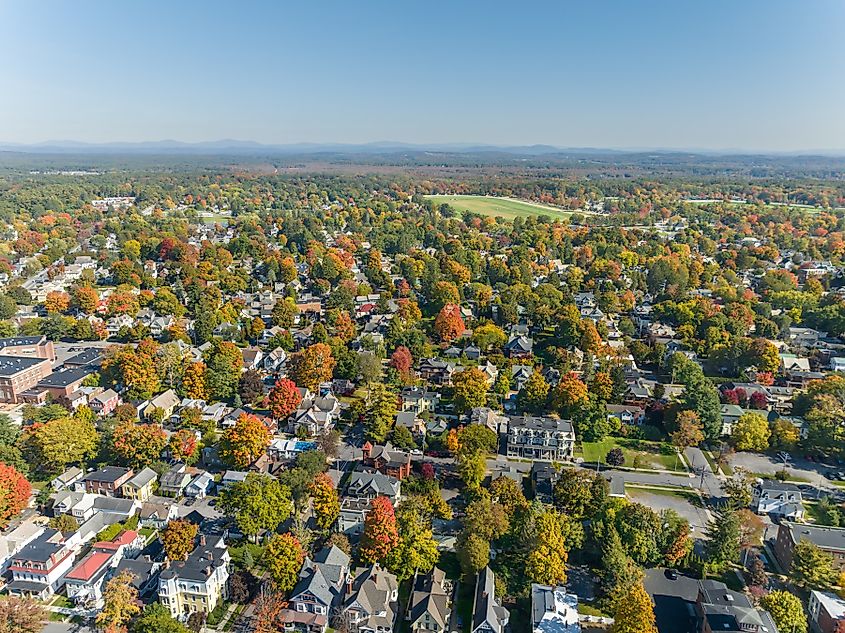 Early afternoon aerial view of Saratoga Springs, New York, showcasing autumn foliage.