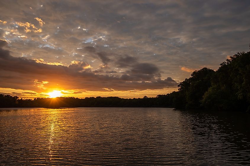 Sunrise over lake in Lums Pond State Park, Delaware.