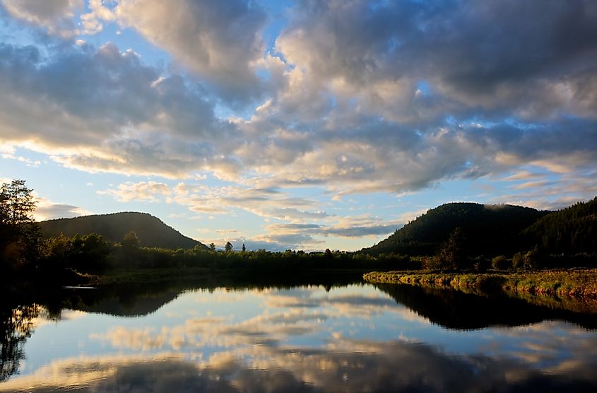 The sun sets on the Pack River where it feeds Lake Pend Orielle, Hope, Idaho.