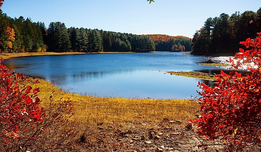 Fall colors and open water of Buckingham Reservoir in Glastonbury, Connecticut.