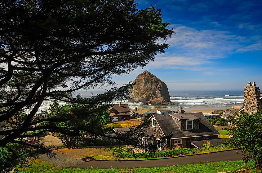 Haystack Rock visible in the distance in Cannon Beach, Oregon.