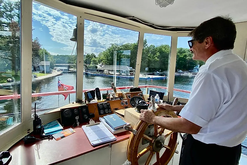 Peerless II Captain Randy brings the ship home to Port Carling. Image credit Bryan Dearsley