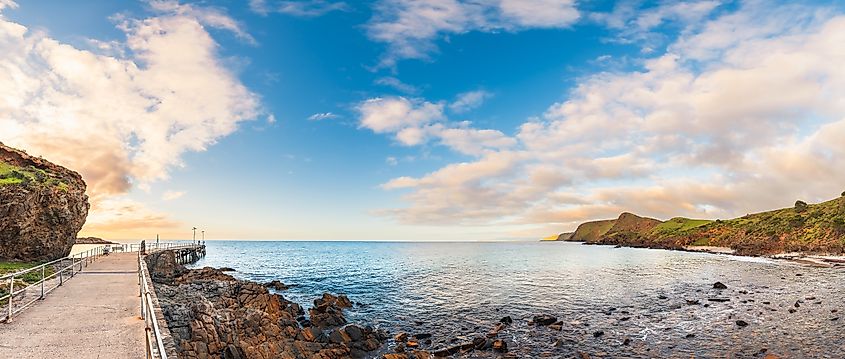 Panoramic view of Second Valley beach with jetty at sunset, Fleurieu Peninsula, South Australia.