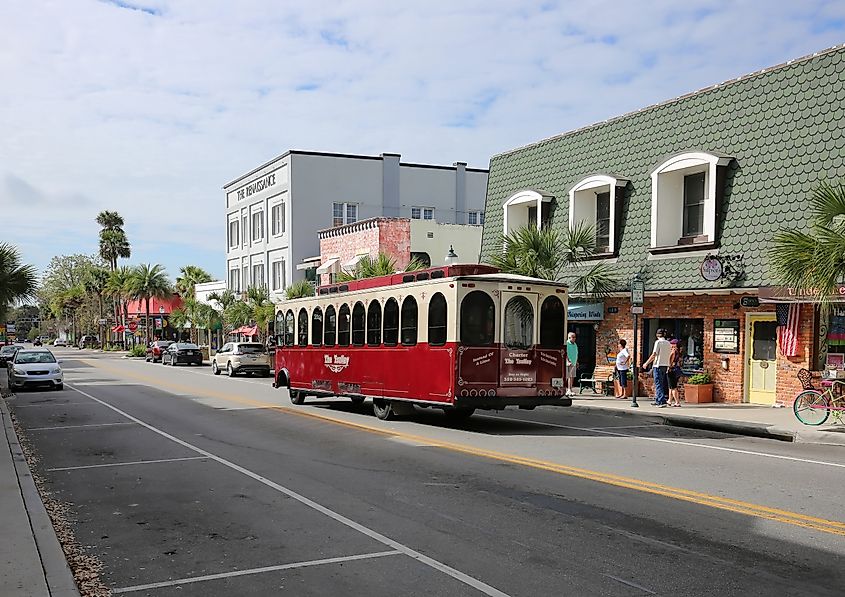 A trolley stops to pick up passengers on Donnelly Street in Mount Dora, Florida.