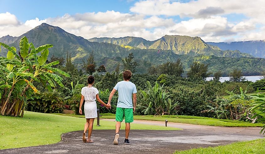 Two young people relaxing at Hanalei Bay Resort in Kauai, Hawaii.