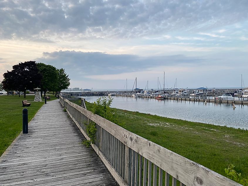 A waterfront boardwalk as seen as dusk descends