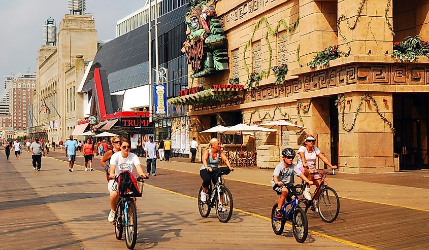 A family takes a bike ride on a beautiful summer's day along the boardwalk in Atlantic City, New Jersey