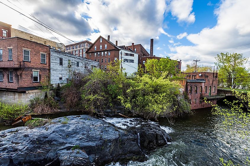 View of buildings and the Whetstone Brook River in downtown Brattleboro, Vermont.