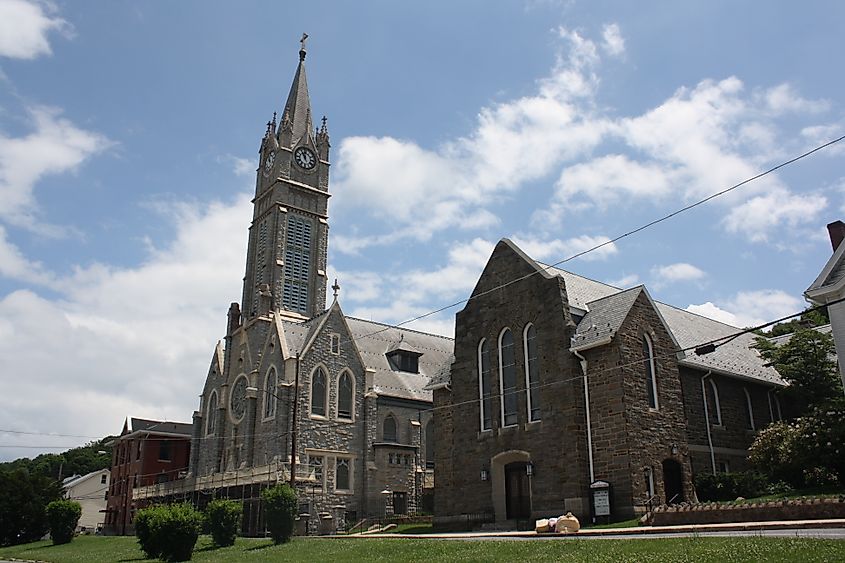 The Lansford Historic District in Lansford, Carbon County, Pennsylvania, featuring Our Lady of the Angels Academy on the left, St. Katharine Drexel Parish in the center, and Trinity Lutheran Church on the right.